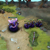 Gameplay screenshot showcasing the Evolution of the Infinite set for Enigma, highlighting his golden orrery armor and custom Eidolon models that are redesigned into unique cosmic beings.