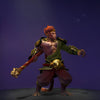 The default skin of Monkey King, shown for comparison with the Champion of the Fire Lotus set. This highlights the transformation into an imposing presence with a blazing visage, ornate fire lotus armor, a fiery greatstaff, and a unique smoldering shoulder familiar.