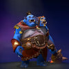 The default skin of Ogre Magi, shown for comparison with the Pyrexae Polymorph Perfected set. This highlights the transformation into a whimsical, two-headed dragon-like form with a patchwork costume, fiery and icy heads, and dynamic particle effects.