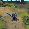 Sven in-game wearing the Stormwrought Arbiter set from The International 2016 Collector's Cache. The jagged crystal armor, horned helmet with glowing eyes, and massive greatsword with its pulsating blue core are clearly visible, showcasing its full impact in battle.