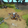 Tinker in-game wearing the Fortified Fabricator set from The International 2016 Collector's Cache. The scrap-built armor, glowing dual-lensed goggles, massive blue-pulsating backpack reactor, and rustic-mechanical arms are clearly visible, showcasing its full impact.