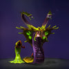 The default skin of Venomancer, shown for comparison with the Verdant Predator set. This highlights the metamorphosis into a botanical nightmare with a multi-headed silhouette, vibrant toxic palette, thorny organic exoskeleton, and bio-luminescent accents, including carnivorous Plague Wards.